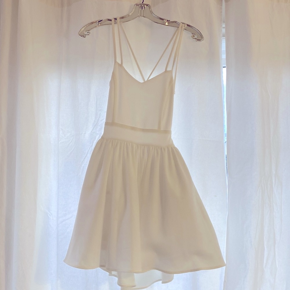 Backless, mini white dress